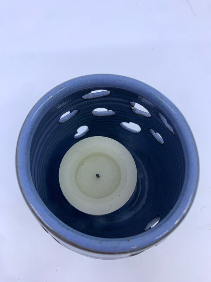 PALE BLUE POTTERY HEART CUT OUT TEA LIGHT HOLDER.