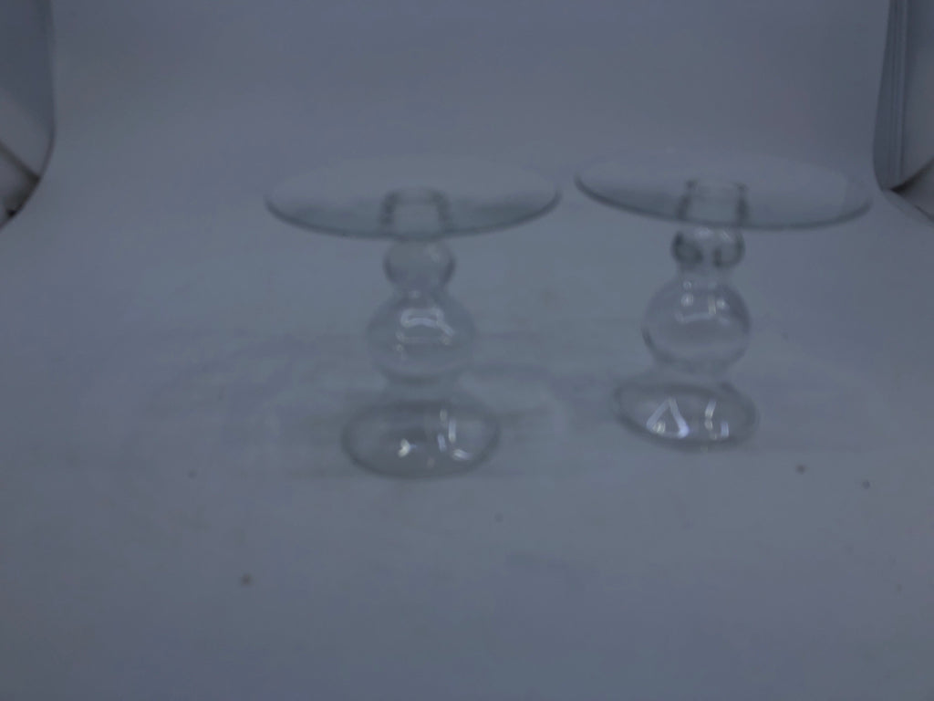 2 GLASS TAPER CANDLE HOLDERS.