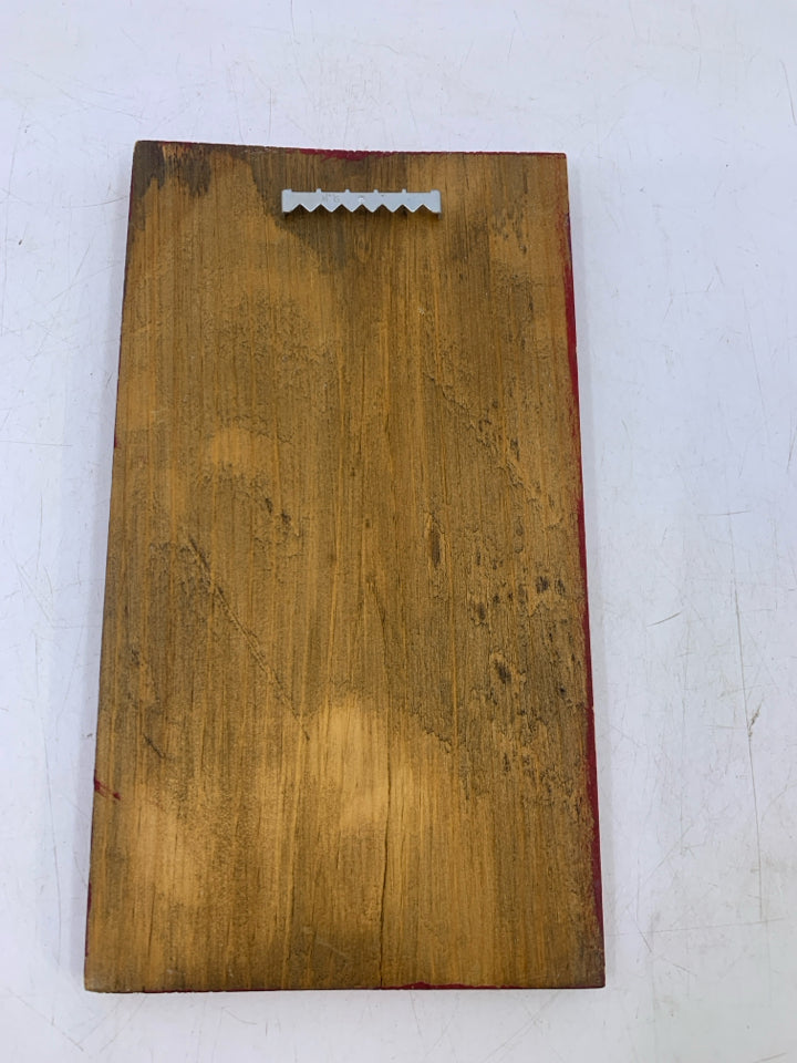 A CAT IN THE HOUSE PRIMITIVE STYLE CHECKERED.