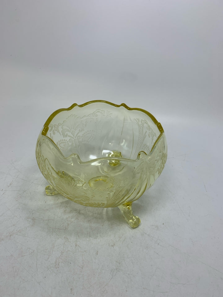VTG FOOTED YELLOW PRESSED DETAILS BOWL W/ UNEVEN EDGE.