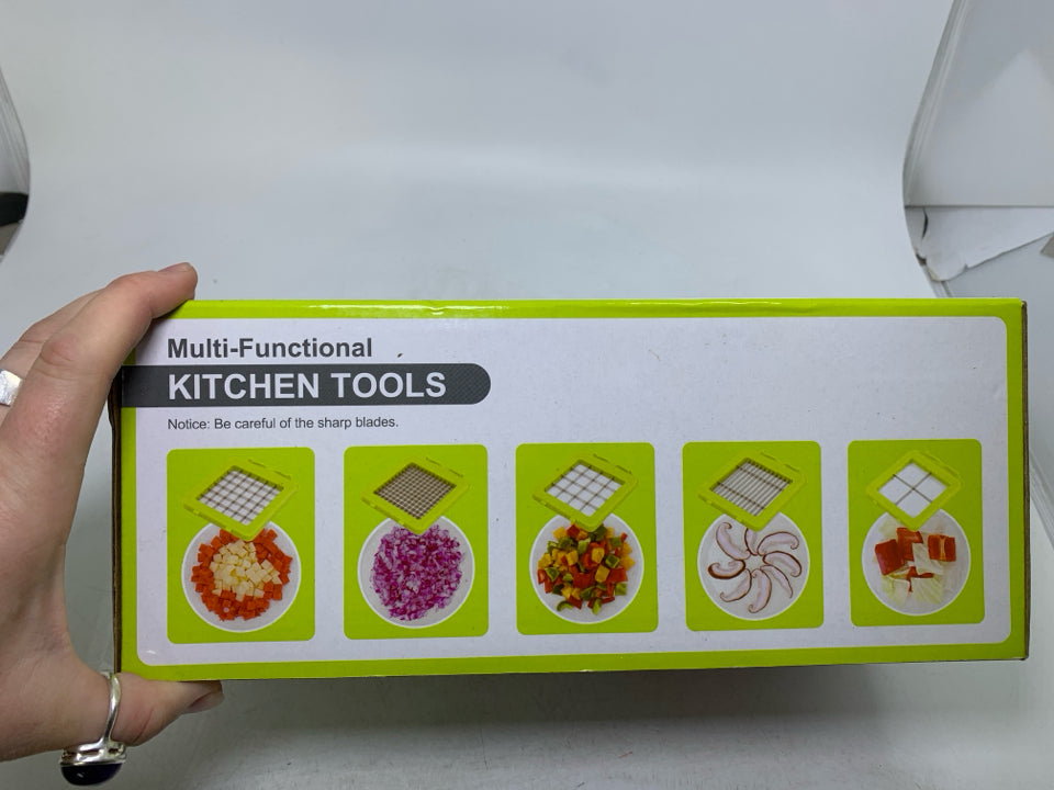 NIB FOOD CHOPPER W/ DIFFERENT BLADES.