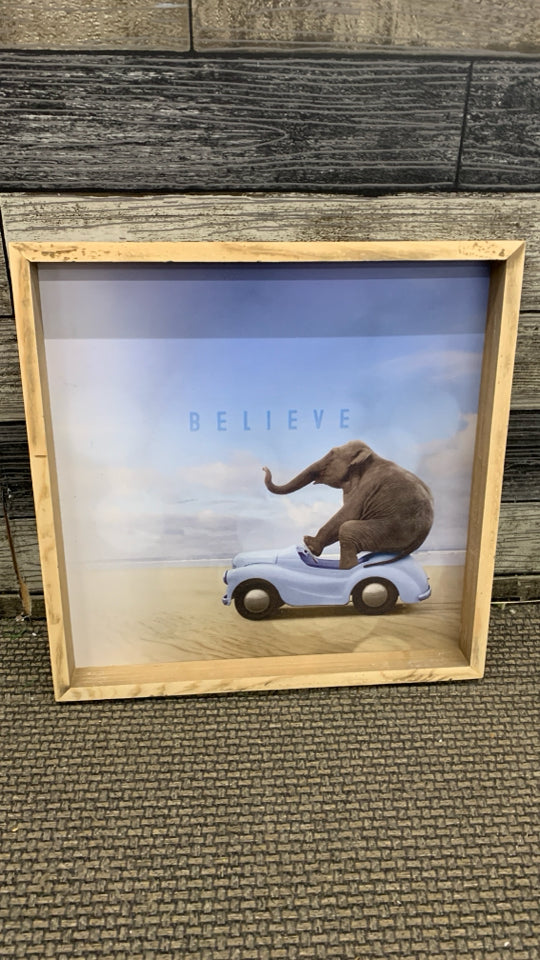 WOOD FRAME ELEPHANT RIDING ON CAR WALL HANGING.