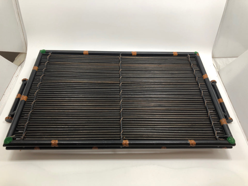 BLACK WICKER TRAY W/METAL RIM AND HANDLES.