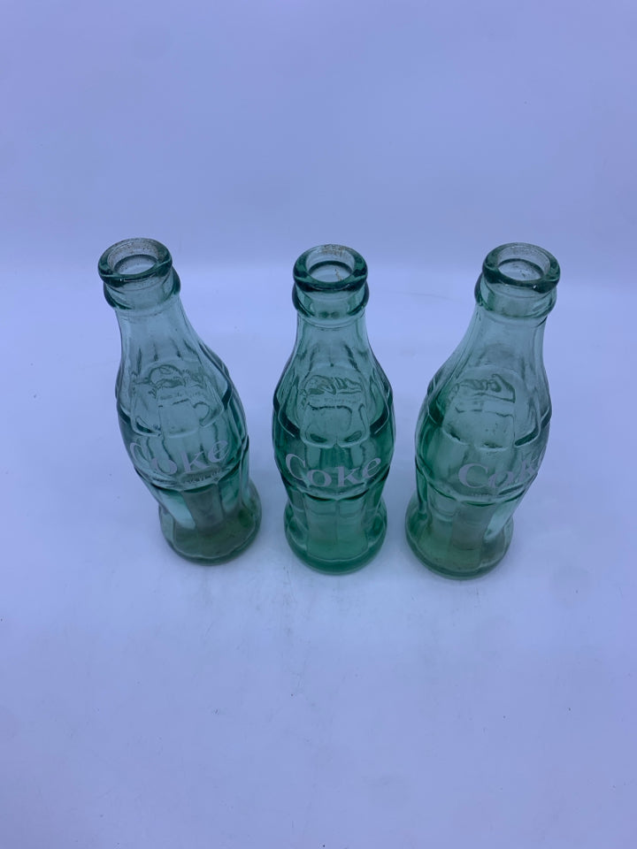 3 COCA-COLA GLASS BOTTLES.