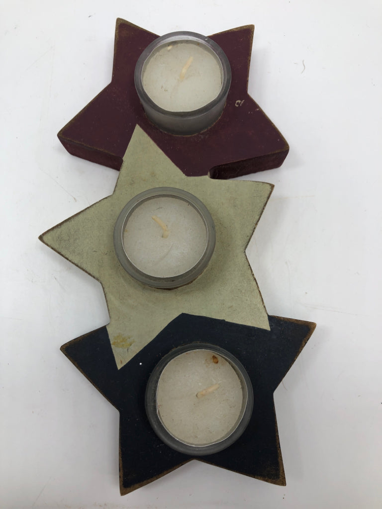 WOOD RED WHITE AND BLUE STAR TEALIGHT HOLDER.