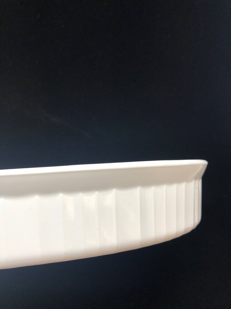 WHITE OVAL CASSEROLE DISH.