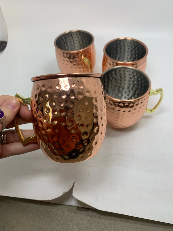 4 COPPER COLORED HAMMERED MOSCOW MULE MUGS.