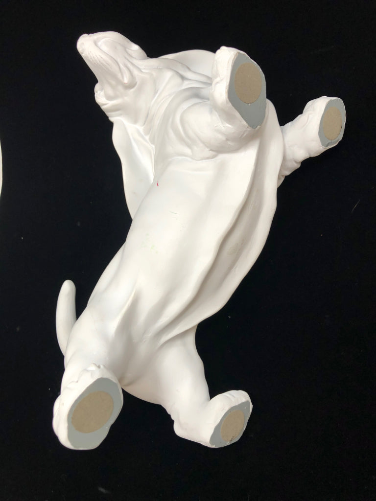 WHITE CERAMIC DOG FIGURINE.