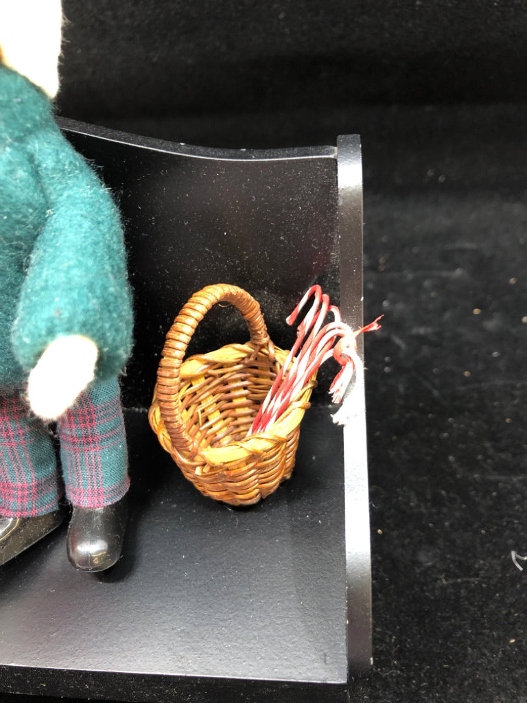 SANTA AND LITTLE BOY BYERS' CHOICE ON BENCH.