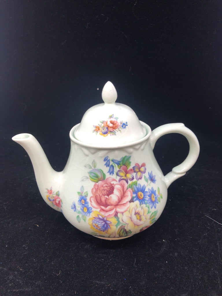 VTG PALE GREEN FLORAL TEAPOT.