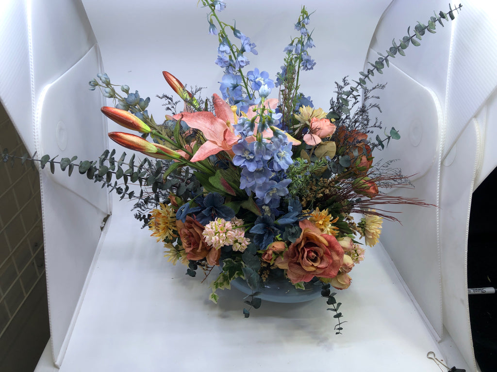 BLUE AND PINK FAUX FLORAL ARRANGEMENT.
