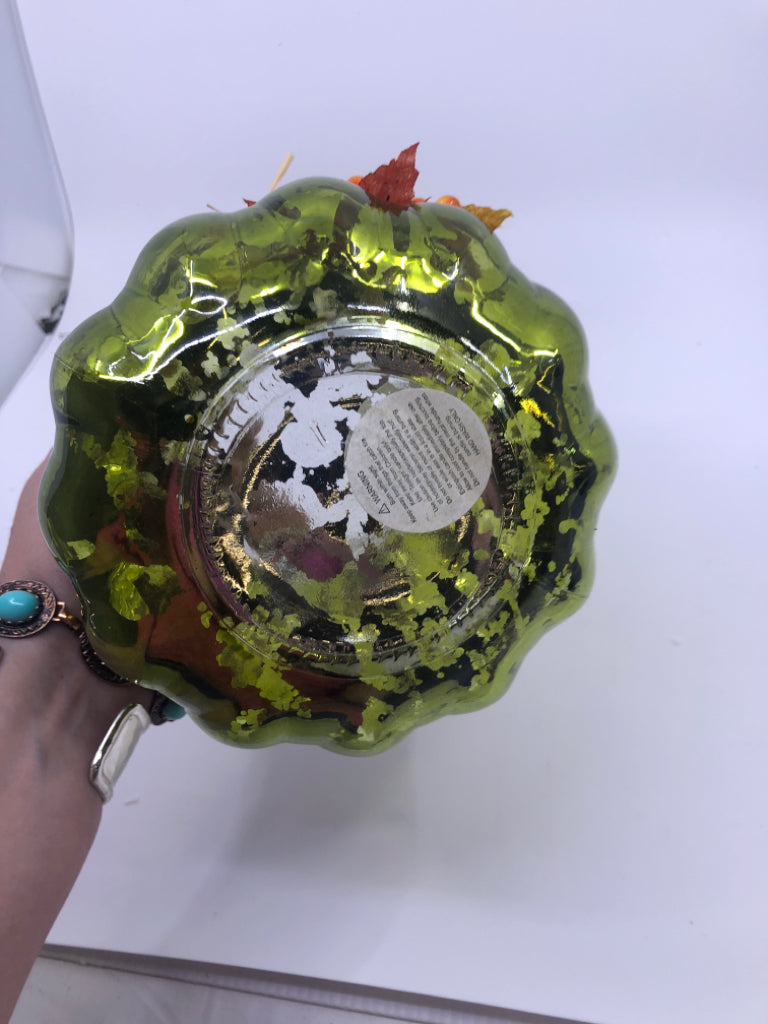 GREEN GLASS CANDLE HOLDER W/LEAVES AND BERRIES.
