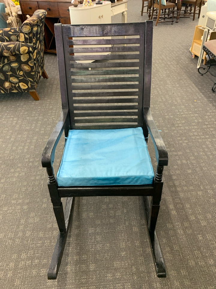 BLACK ROCKING CHAIR W TEAL CUSHION.