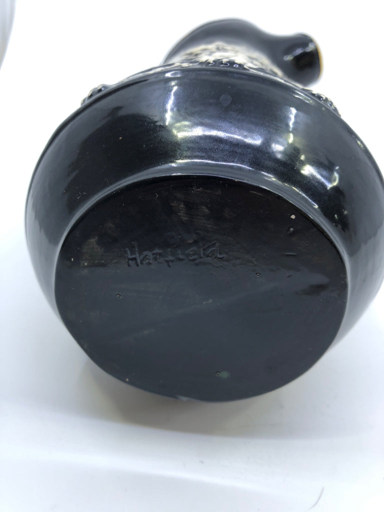 VTG BLACK W EMBOSSED PEOPLE DANCING PITCHER.