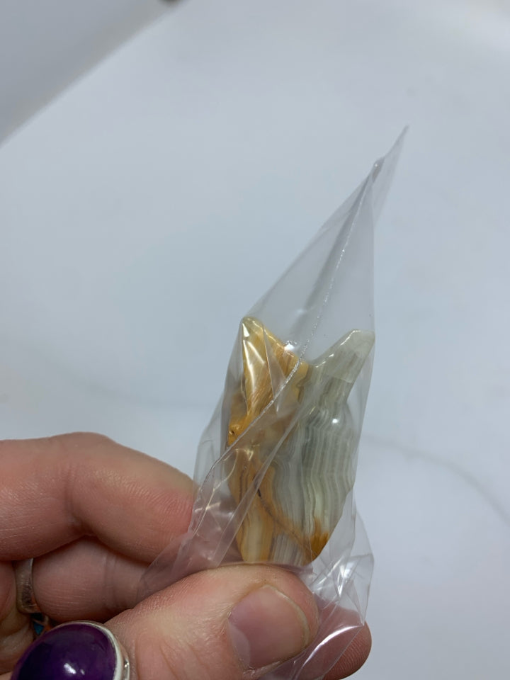 STONE CARVED PENGUIN/BIRD IN BAG.