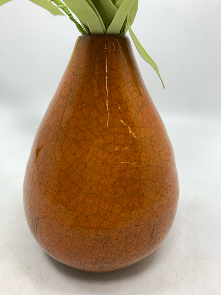 ORANGE CRACKLE VASE W/YELLOW FLORALS.