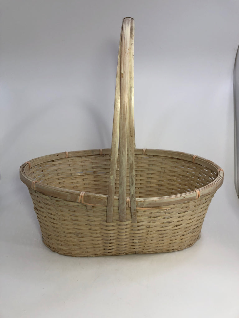 WHITE OVAL WOODEN BRAIDED BASKET W/WRAPPED HANDLE.