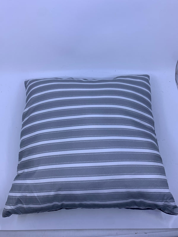 GREY AND WHITE REVERSIBLE PILLOW.