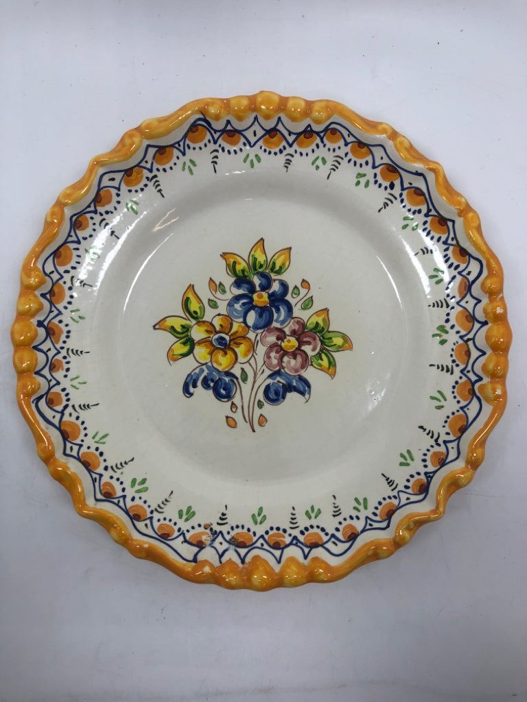 FLORAL EMBOSSED PLATE W/YELLOW RUFFLED EDGE.