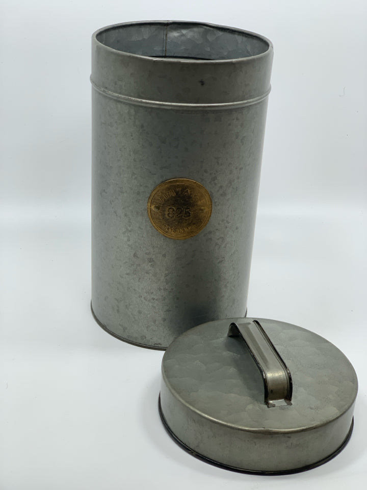 GREY METAL CANISTER W/VINTAGE LABEL AND LID.