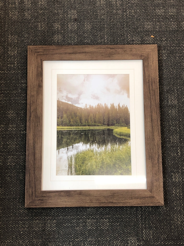 WATER-SIDE PRINT IN WOOD FRAME.
