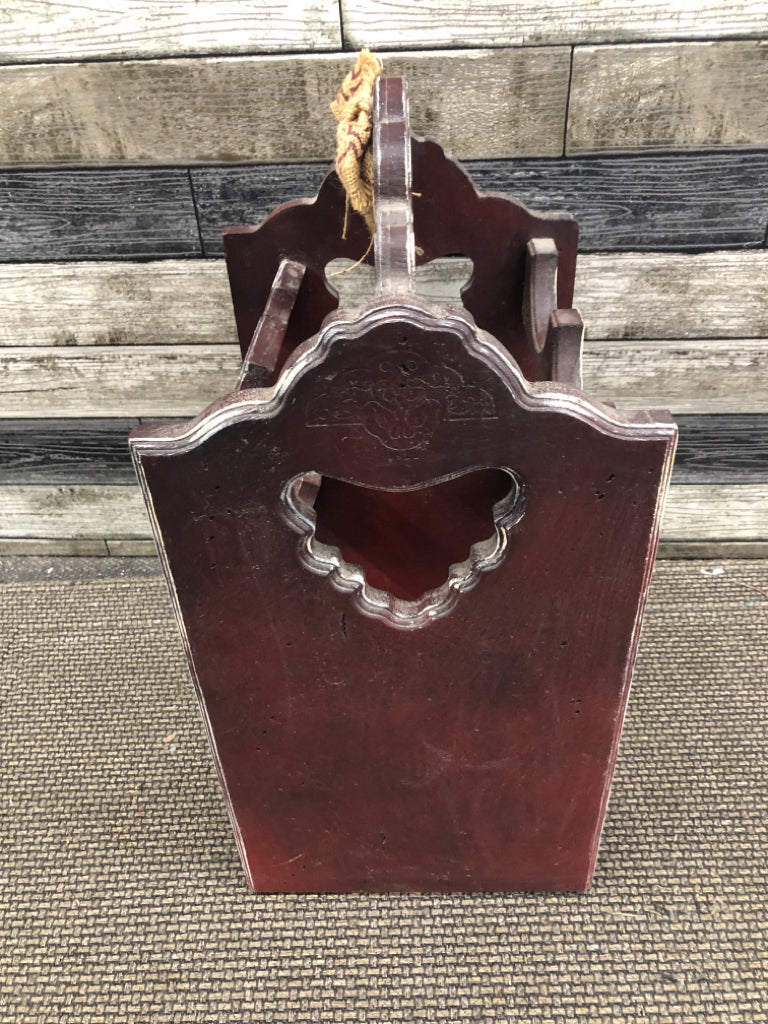 PRIMITIVE WINE HOLDER.
