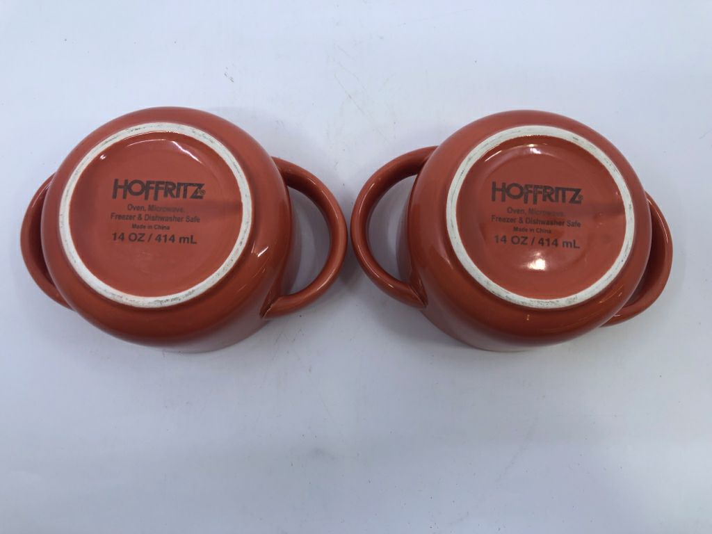 2 ORANGE BAKERS W HANDLES.