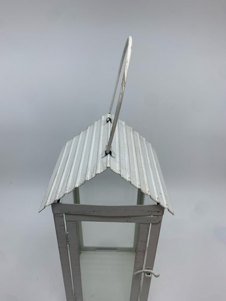 WHITE METAL CANDLE LANTERN.