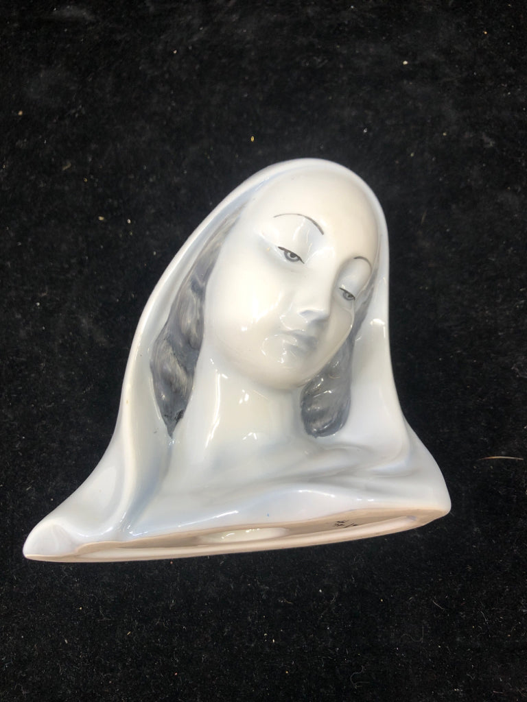 CERAMIC BLUE TINTED WOMANS HEAD.