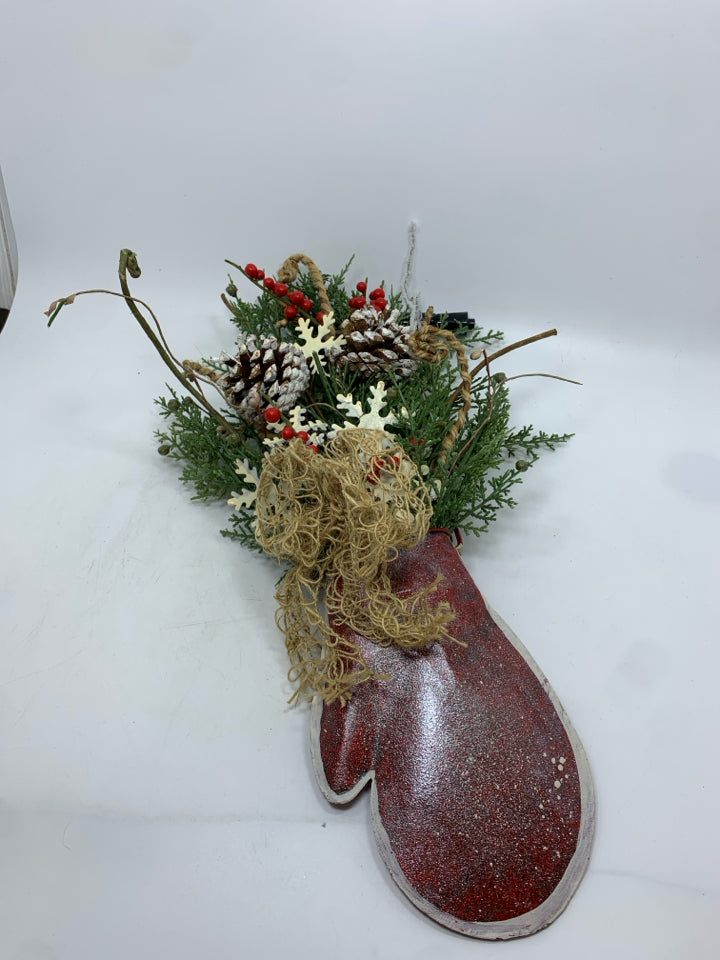 FAUX WINTER FOLIAGE IN RED METAL SPARKLY MITTEN WALL HANGING.