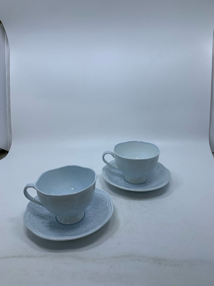 4 PC SVC 2 TEACUP & SAUCERS EMBOSSED BUTTERFLIES RETIRED.