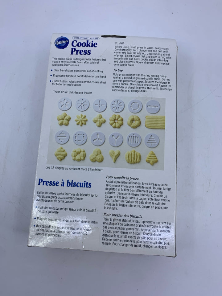 NIB WILTON COOKIE PRESS.