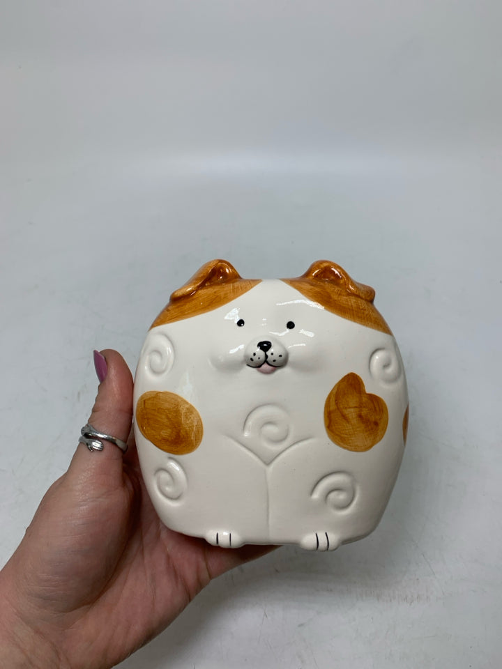 SPOTTED CERAMIC DOG COIN BANK.