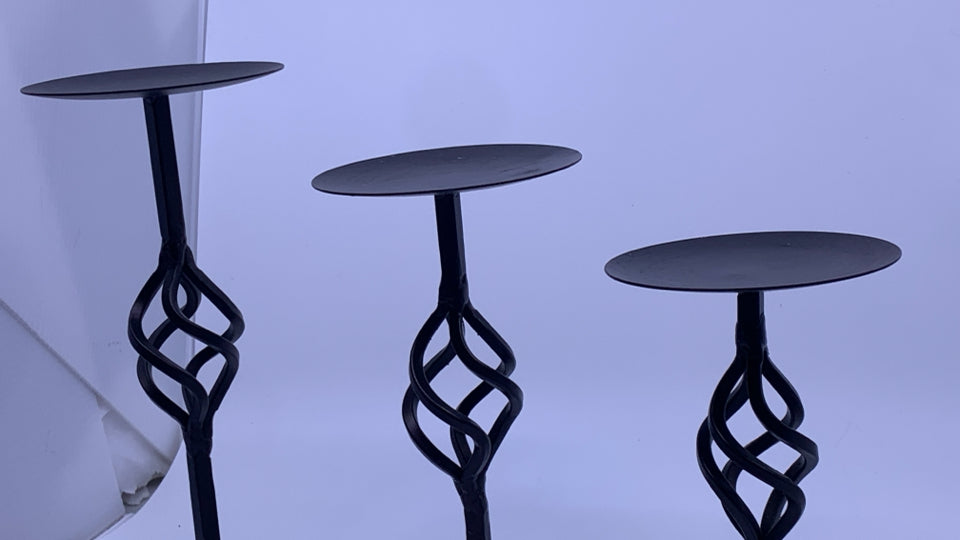3 METAL SCROLL PILLAR CANDLE HOLDERS.