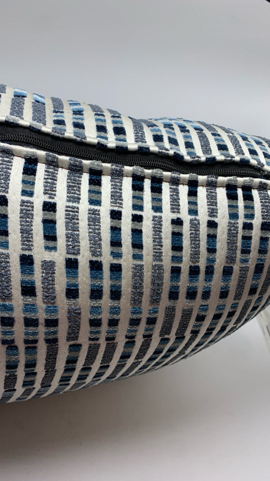 MULTI-STITCHED BLUE ACCENT PILLOWS.