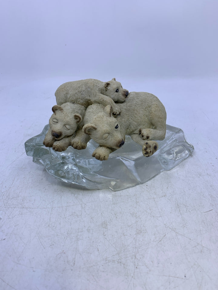 POLAR BEARS ON GLASS ICEBERG.