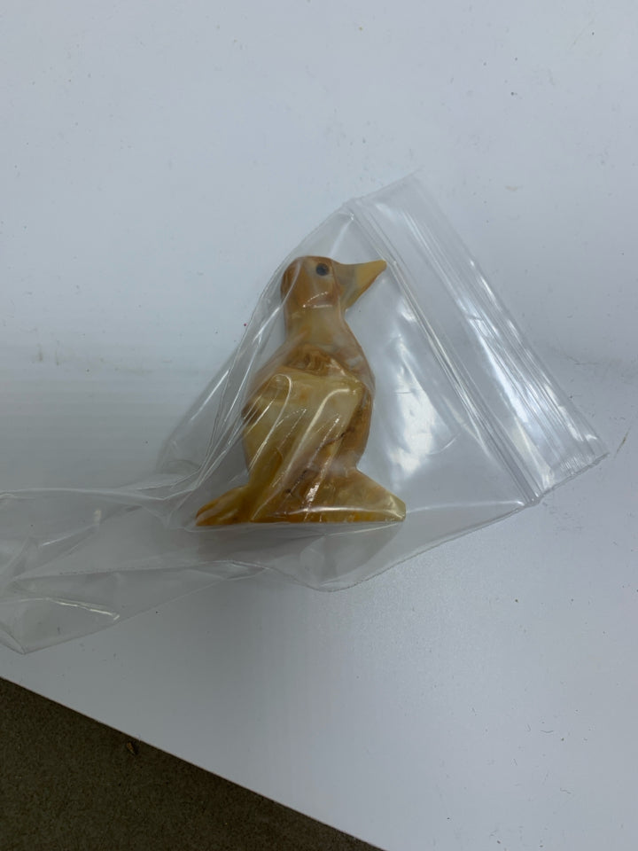 STONE CARVED PENGUIN/BIRD IN BAG.
