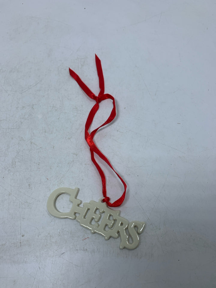 IVORY LENOX CHEERS ORNAMENT.