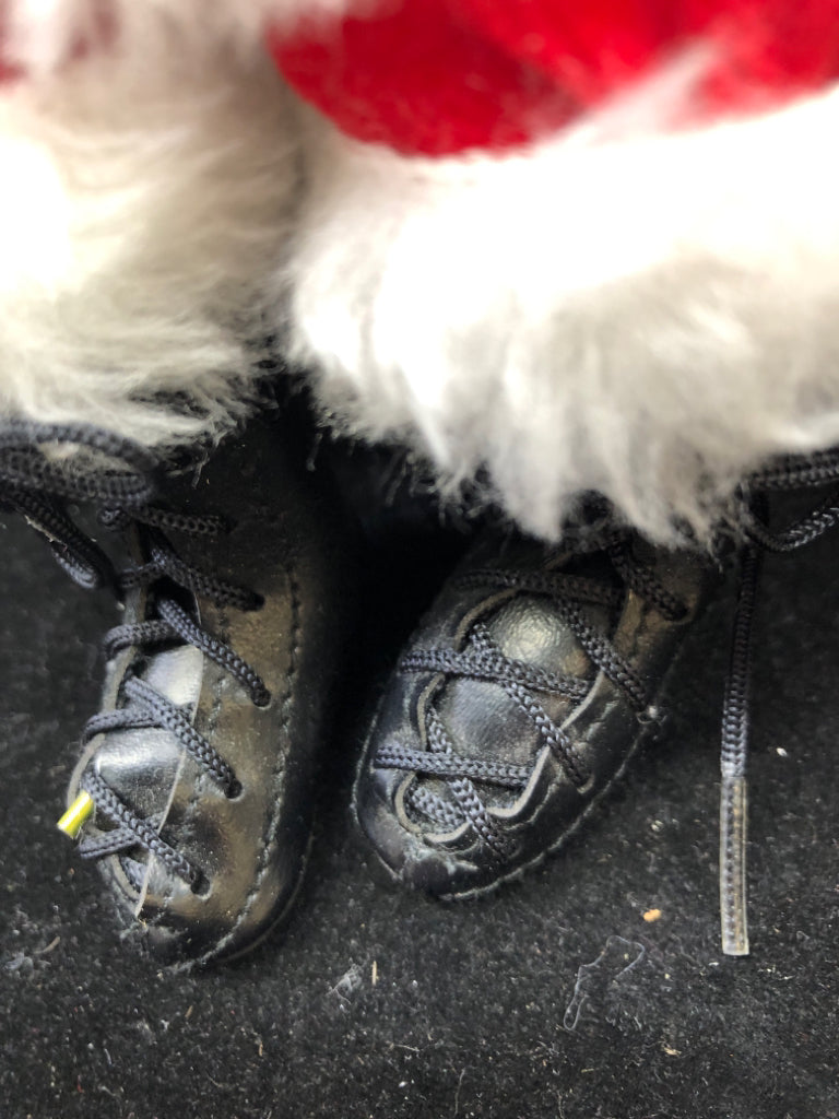 SANTA AND LITTLE BOY BYERS' CHOICE ON BENCH.