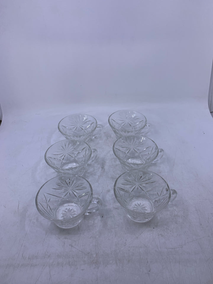 6 SHORT GLASS CUPS W/ STAR PATTERN.