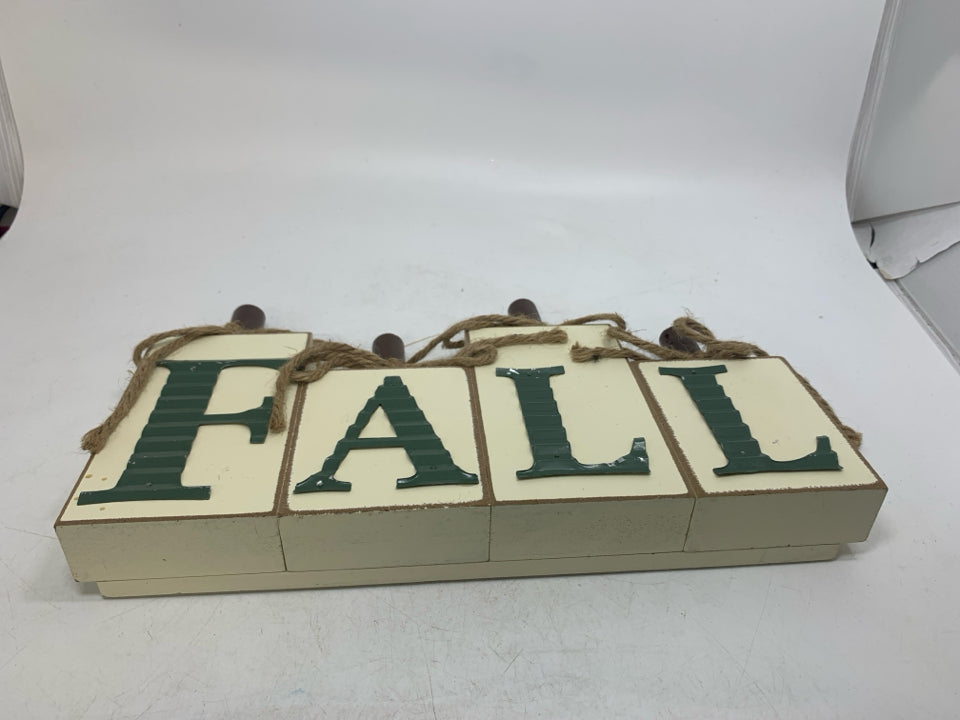 BLOCK FALL CREAM COLORED SIGN W/ GREEN METAL.