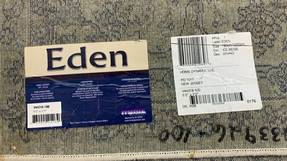 CREAM AREA RUG W/ BLUE,BROWN,GREY PAISLEY DESIGN EDEN.