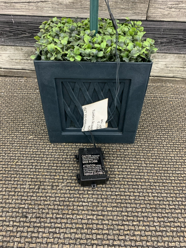 FAUX DOUBLE BALL LIGHT UP GREENERY IN GREEN PLASTIC POT.