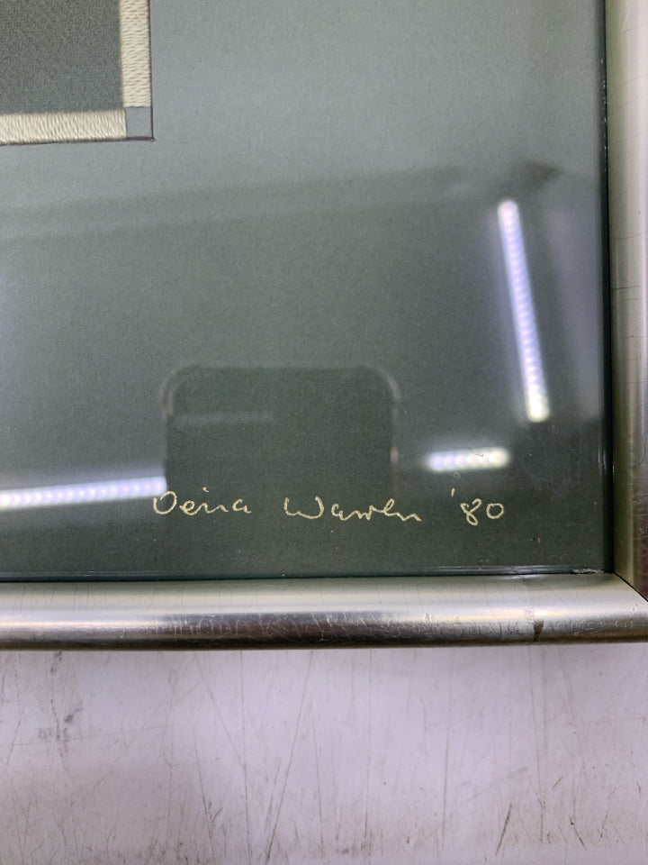 YARN EMBROIDERED GREENS LANDSCAPE IN SILVER FRAME.