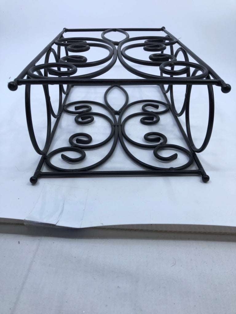 BROWN SCROLL WINE RACK.