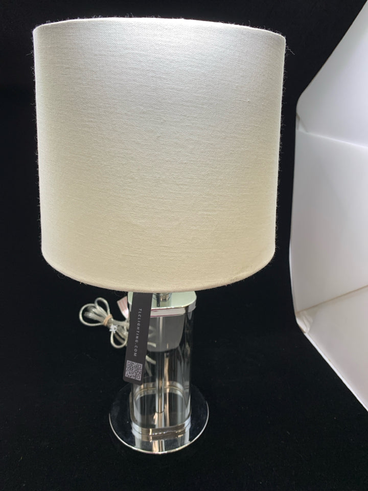 CLEAR/SILVER BASE LAMP W/WHITE SHADE.