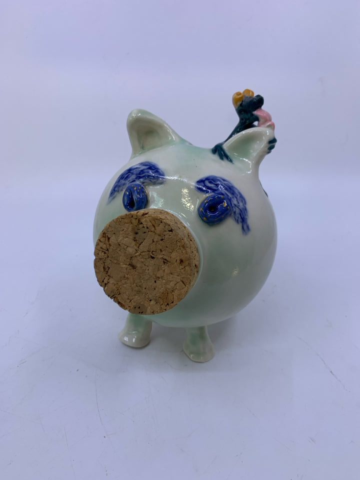 MINT GREEN POTTERY PIGGY BANK W/ CORK NOSE/ FROG LICKING EAR.