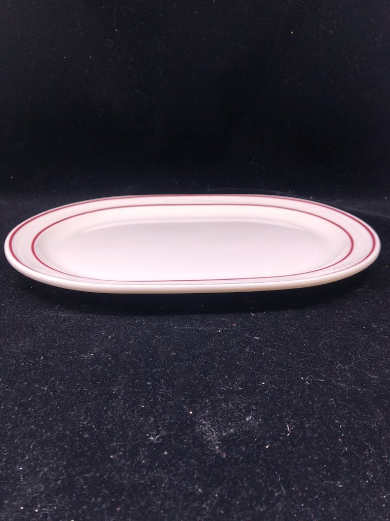 4 OVAL PLATES W RED RIM.