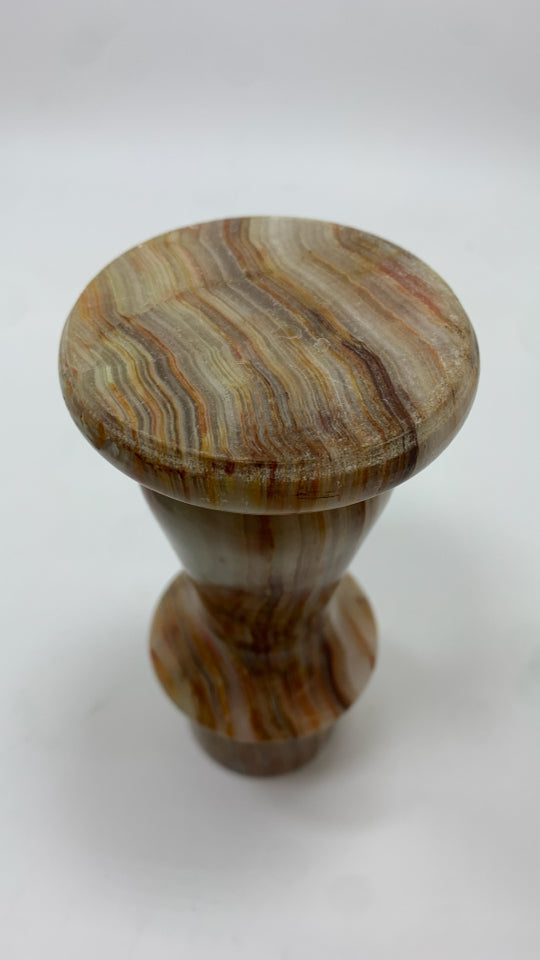 BROWN MARBLE CANDLESTICK HOLDER.
