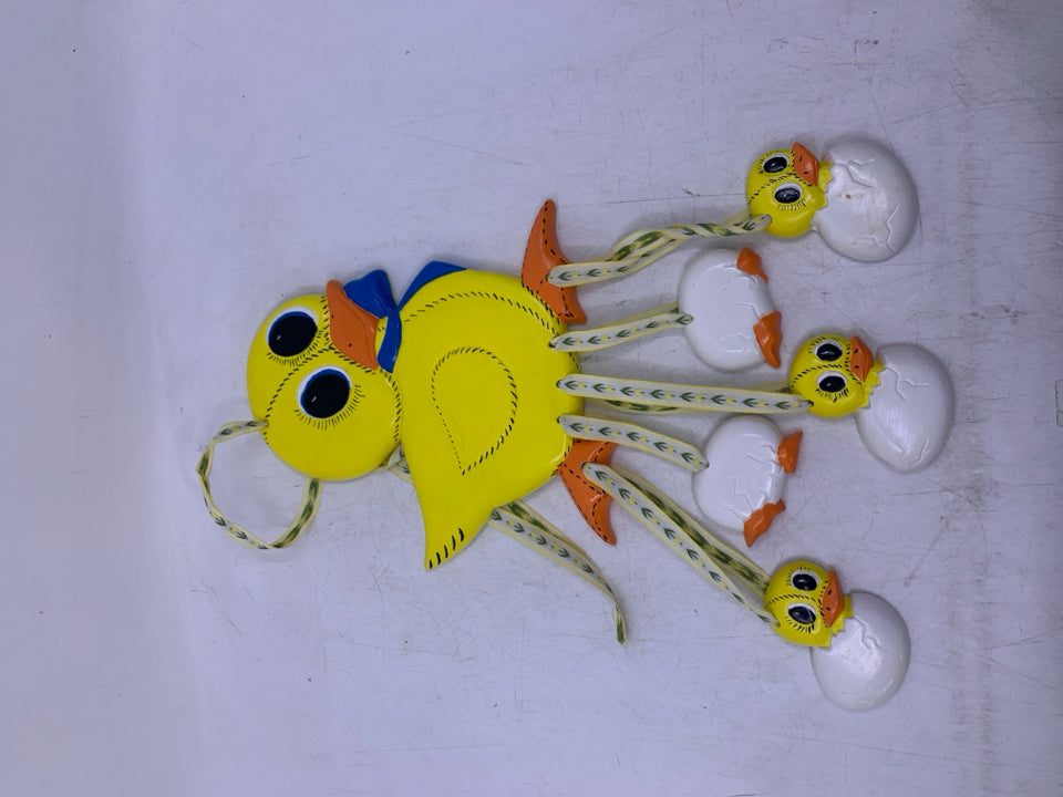 CERAMIC YELLOW DUCK W/ HANGING HATCHING DUCKLINGS.